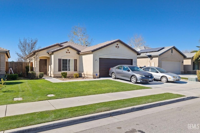 view of front facade with a front lawn and a garage