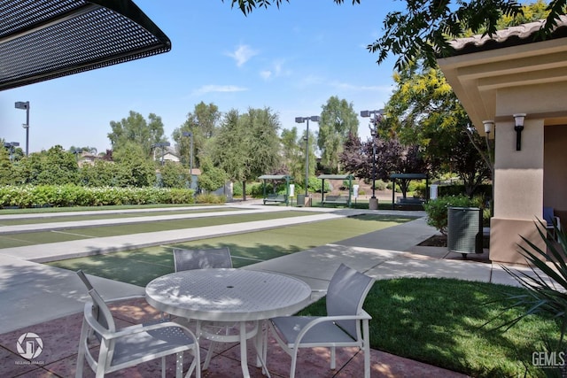 view of patio with central AC unit