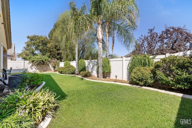 view of yard featuring central AC unit