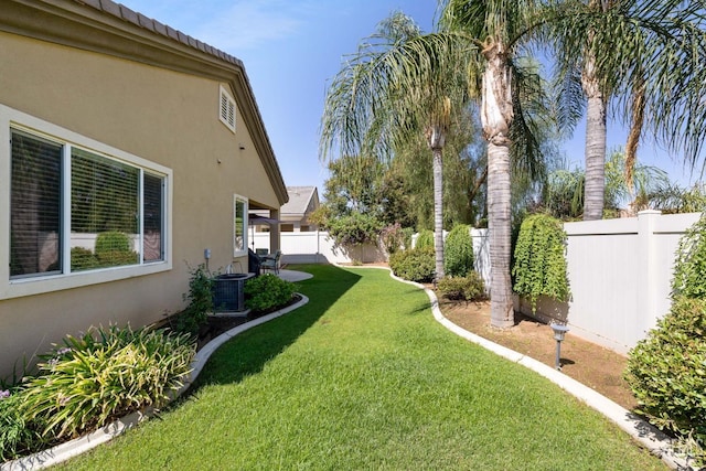 view of yard featuring central AC