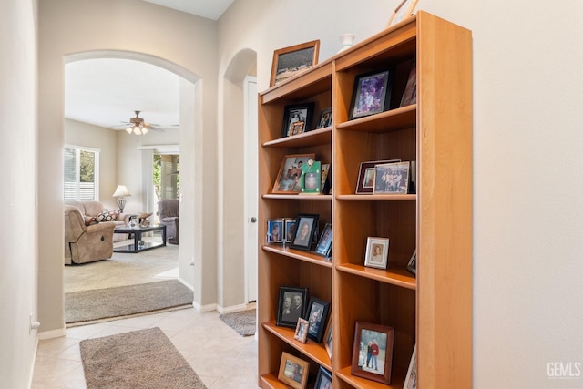 hallway featuring light tile patterned floors