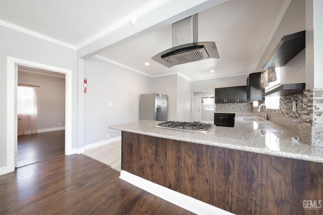 2200 Park Way, Bakersfield, CA 93304 - kitchen featuring stainless steel appliances, exhaust hood, a peninsula, light stone counters, and wood finished floors