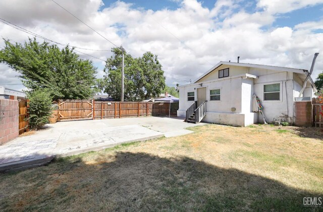 2200 Park Way, Bakersfield, CA 93304 - rear view of property featuring entry steps, a patio area, and stucco siding