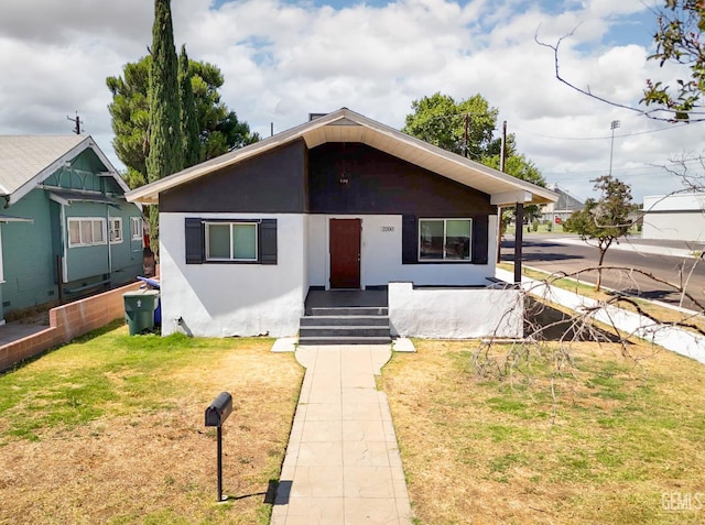 2200 Park Way, Bakersfield, CA 93304 - bungalow with stucco siding and a front yard