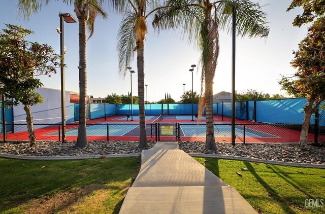 view of sport court featuring tennis court