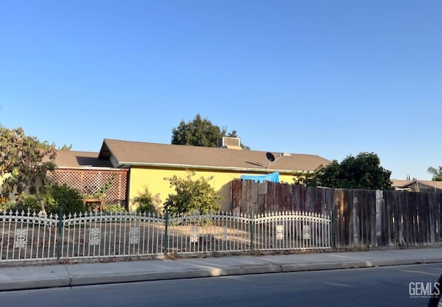 view of front of property with central AC unit