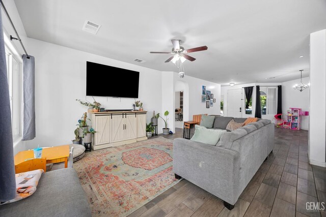 2004 Suncrisp Ln, Bakersfield, CA 93312 - living area with ceiling fan, wood finished floors, and a chandelier