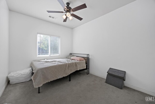 2004 Suncrisp Ln, Bakersfield, CA 93312 - carpeted bedroom with baseboards and a ceiling fan