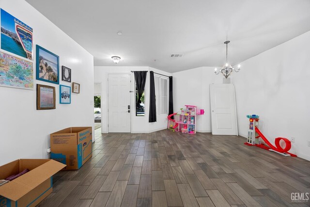 2004 Suncrisp Ln, Bakersfield, CA 93312 - playroom with wood finished floors and a chandelier