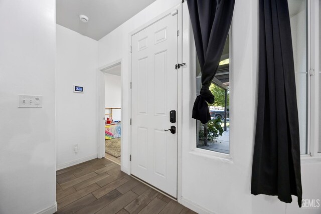 2004 Suncrisp Ln, Bakersfield, CA 93312 - foyer featuring dark wood-type flooring and baseboards