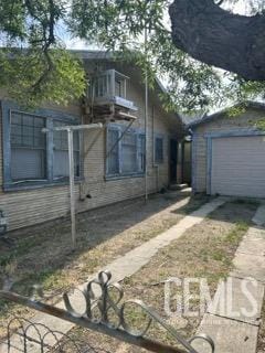 view of property exterior with driveway