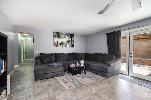 living room featuring plenty of natural light and light tile patterned floors