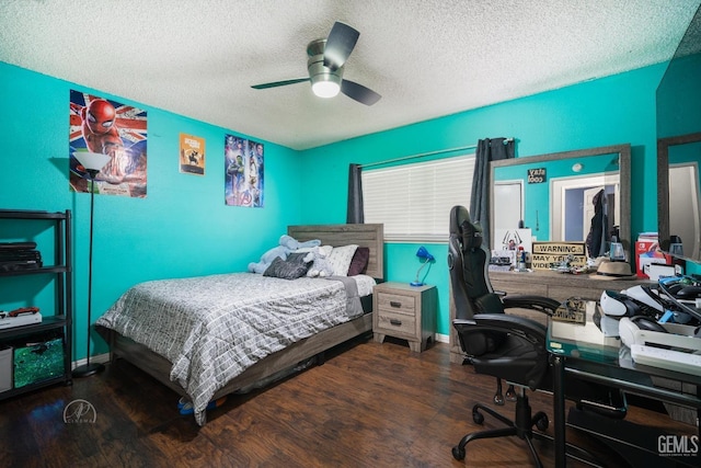 bedroom featuring a textured ceiling, ceiling fan, and wood finished floors