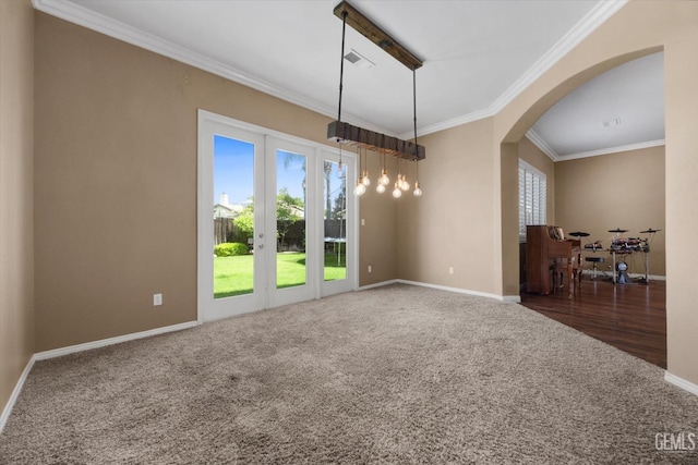 9508 Canyon Lake Ct, Bakersfield, CA 93312 - empty room with carpet floors, arched walkways, baseboards, and ornamental molding