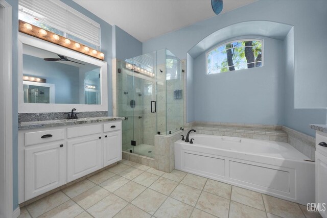 9508 Canyon Lake Ct, Bakersfield, CA 93312 - full bathroom featuring vanity, a garden tub, tile patterned floors, and a stall shower