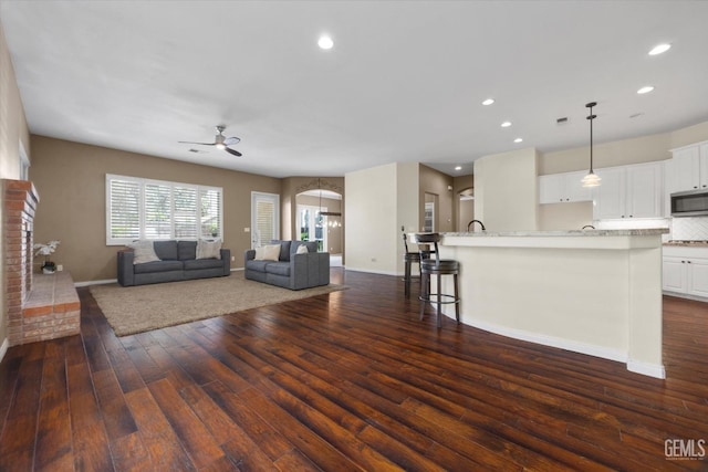 9508 Canyon Lake Ct, Bakersfield, CA 93312 - living area with baseboards, recessed lighting, ceiling fan, and dark wood-style floors