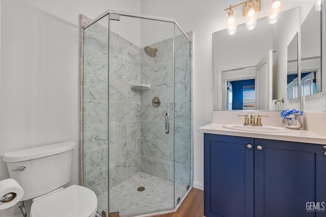 16711 Keystone Pl, Bakersfield, CA 93314 - bathroom featuring vanity, a stall shower, and wood finished floors