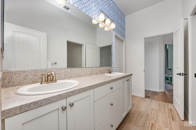 16711 Keystone Pl, Bakersfield, CA 93314 - bathroom featuring double vanity and baseboards