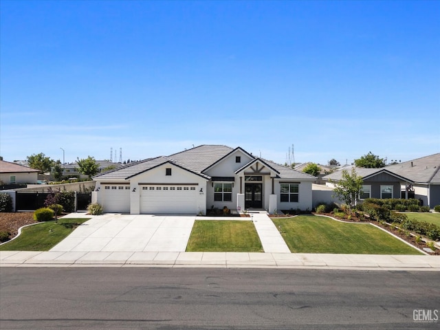 16711 Keystone Pl, Bakersfield, CA 93314 - ranch-style home featuring a garage, a front yard, driveway, a tiled roof, and stucco siding