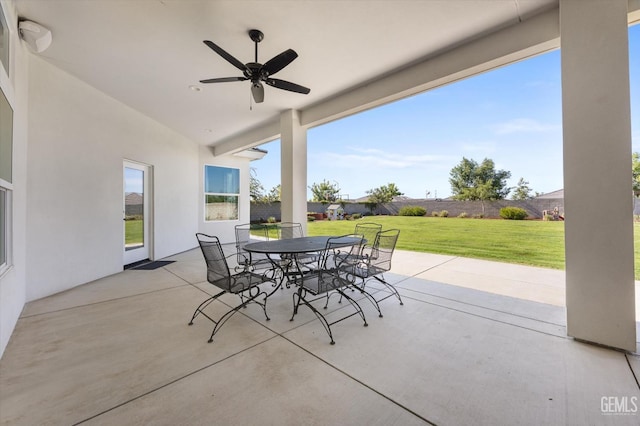 16711 Keystone Pl, Bakersfield, CA 93314 - fenced backyard featuring outdoor dining space, a ceiling fan, and a patio area