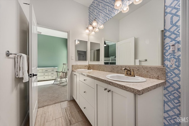 16711 Keystone Pl, Bakersfield, CA 93314 - full bathroom with double vanity and a chandelier