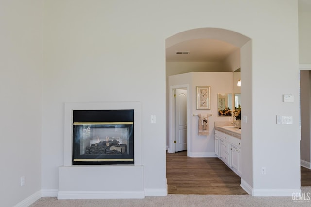 1715 Norwich Way, Bakersfield, CA 93311 - living area with arched walkways and baseboards