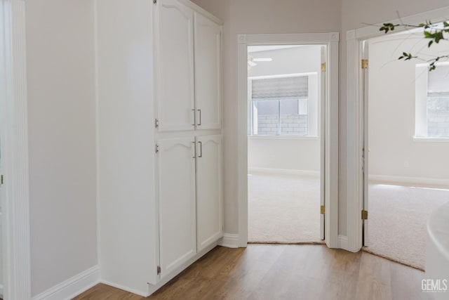 1715 Norwich Way, Bakersfield, CA 93311 - hallway featuring light wood finished floors and baseboards