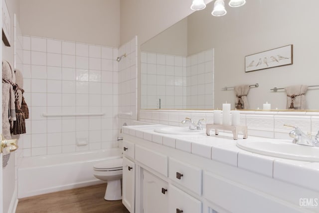 1715 Norwich Way, Bakersfield, CA 93311 - full bathroom featuring double vanity, wood finished floors, and bathing tub / shower combination