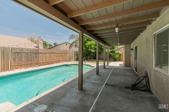 4810 Bluestone Dr, Bakersfield, CA 93311 - view of swimming pool featuring a fenced backyard and a patio area