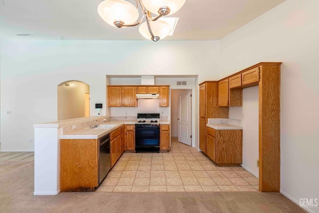 4810 Bluestone Dr, Bakersfield, CA 93311 - kitchen featuring gas range oven, dishwasher, a peninsula, and brown cabinetry