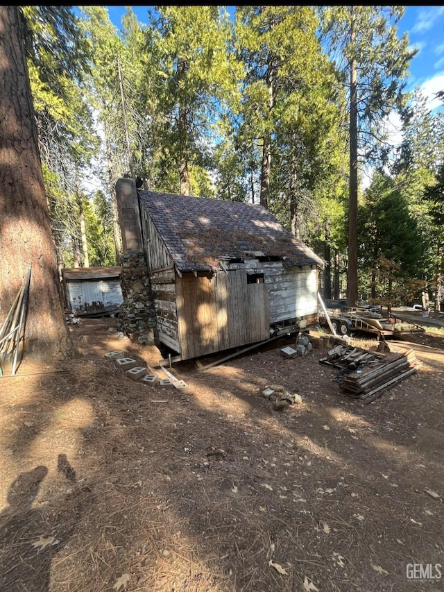 view of outbuilding featuring an outdoor structure