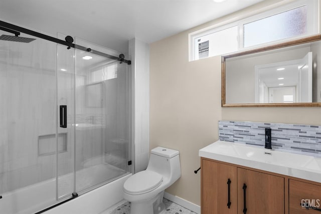 full bathroom with enclosed tub / shower combo, backsplash, toilet, vanity, and baseboards