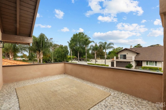 view of patio / terrace with a balcony