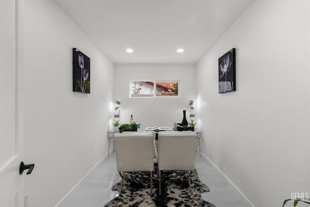 office space with baseboards and recessed lighting