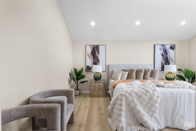 bedroom featuring recessed lighting, baseboards, and light wood-style floors