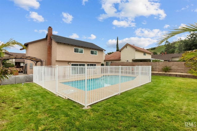 view of swimming pool with a patio, a fenced in pool, a pergola, a yard, and a fenced backyard