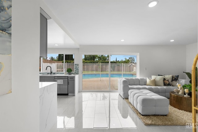 living room featuring recessed lighting and light tile patterned floors