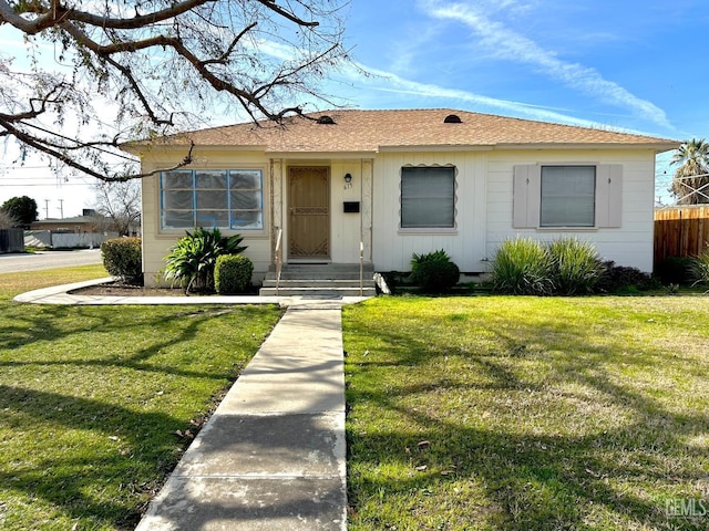 view of front of home with a front lawn