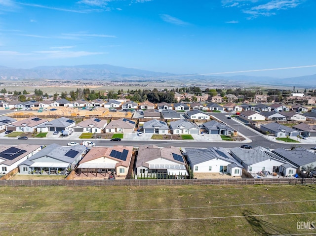 bird's eye view with a residential view and a mountain view