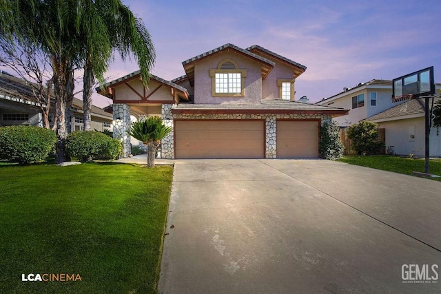 view of front of house with a lawn and a garage