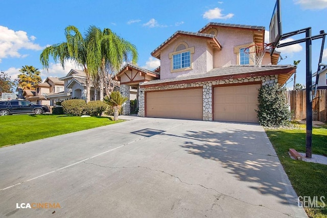 view of front facade featuring a front yard and a garage