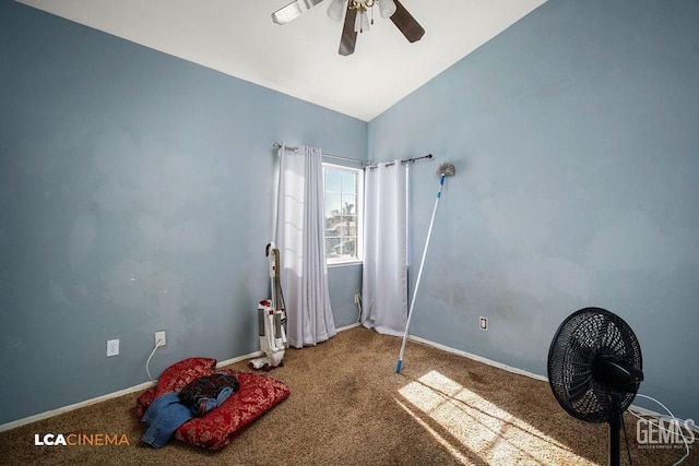 interior space featuring carpet floors, ceiling fan, and vaulted ceiling