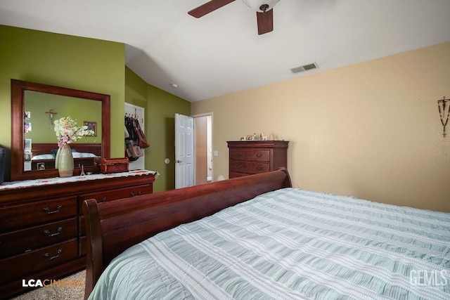 bedroom with ceiling fan and lofted ceiling