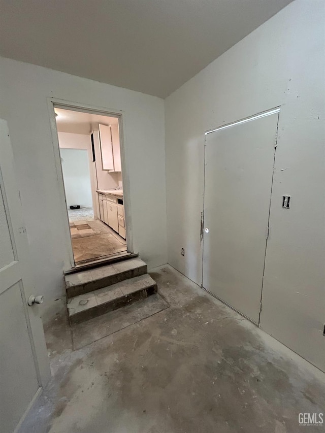 905 Hacienda Dr, Bakersfield, CA 93307 - unfurnished bedroom featuring unfinished concrete flooring