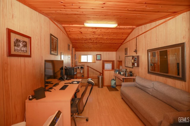 office area featuring light hardwood / wood-style flooring, vaulted ceiling, wooden ceiling, and wood walls