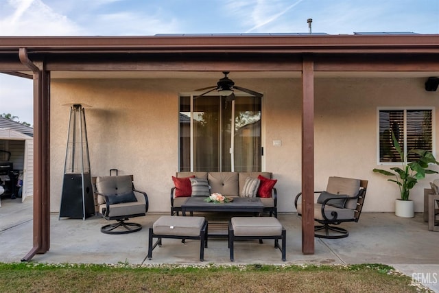 view of patio featuring ceiling fan and outdoor lounge area