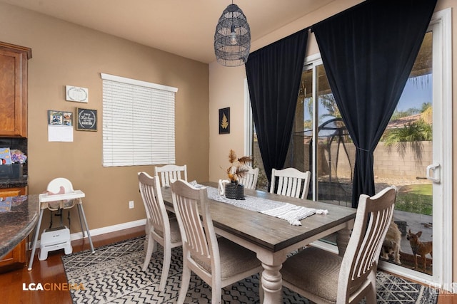 dining area featuring hardwood / wood-style flooring