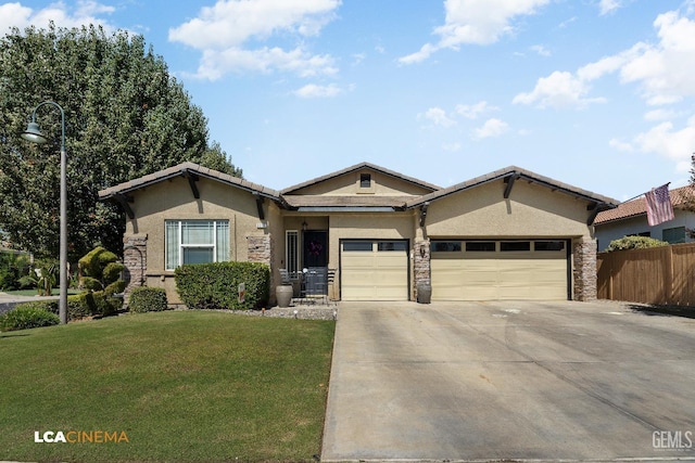 ranch-style house with a garage and a front yard