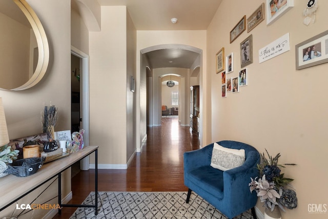 corridor featuring dark hardwood / wood-style flooring