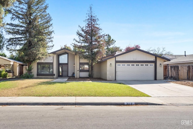 3112 Harrogate Ln, Bakersfield, CA 93309 - mid-century home featuring a garage and driveway